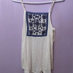 A blue and white tank top
